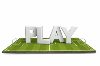 Football, soccer pitch with white play text. 3D Rendering - Comprehensive inspection services ensuring compliance and integrity for gaming platforms and systems globally.