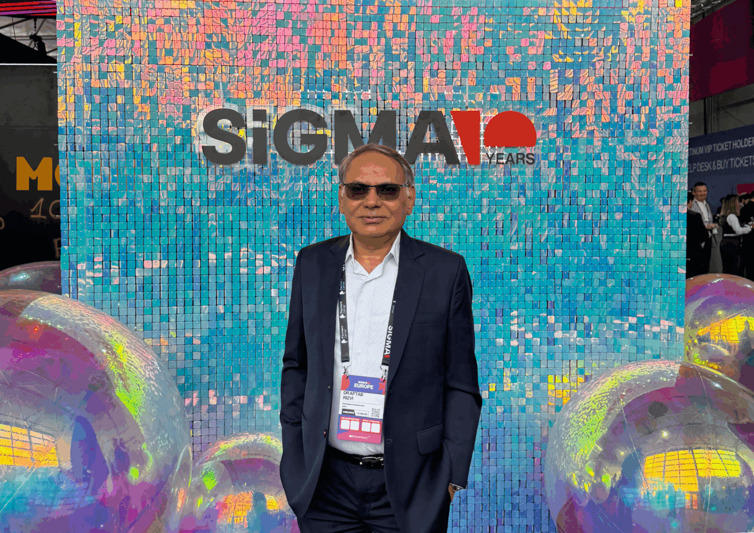 Dr. Aftab Rizvi, Chairman – The Associates Group | Risk Associates & Gaming Associates; Srikanth Balini, Chief Business Officer at Gaming Associates with 18+ years in QA, Compliance & Business; Zuhair Rizvi, Director of Operations — showcasing leadership, expertise, and Wagering excellence in the gaming industry.