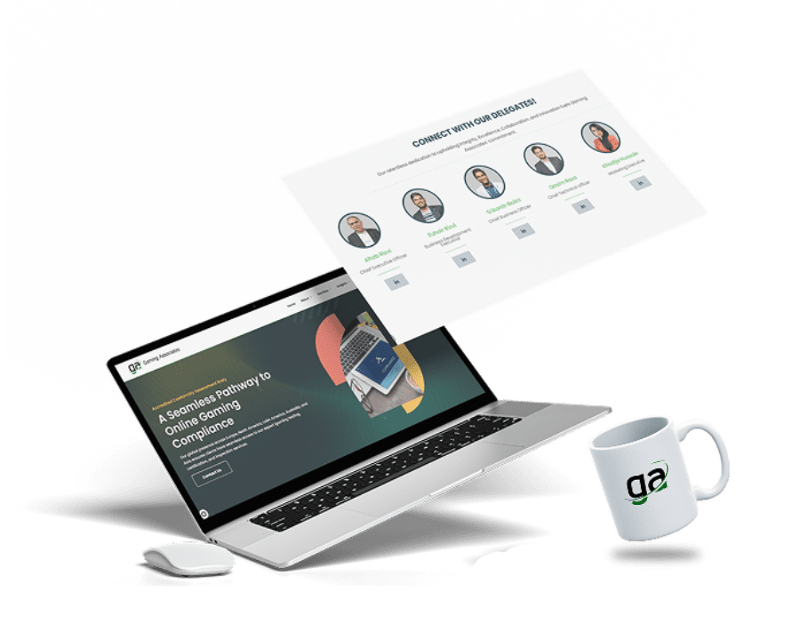 Mockup featuring a laptop displaying the Gaming Associates website, a floating contact page with team members, a computer mouse, and a branded coffee mug with the GA logo.